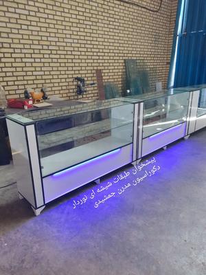 پیشخوان دکور ویترین قفسه رگال کانتر دکورداروخانه در تهران